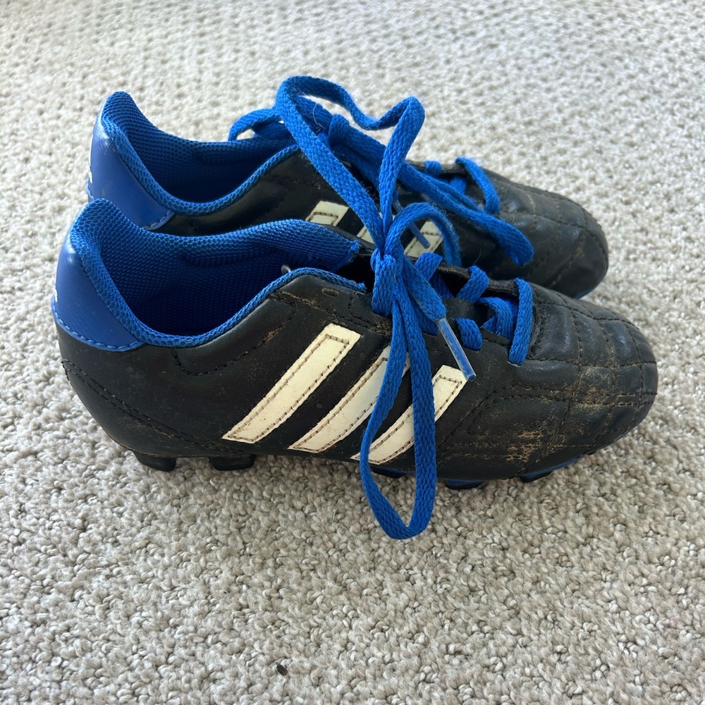 Adidas Black and Blue cleats with Classic Design